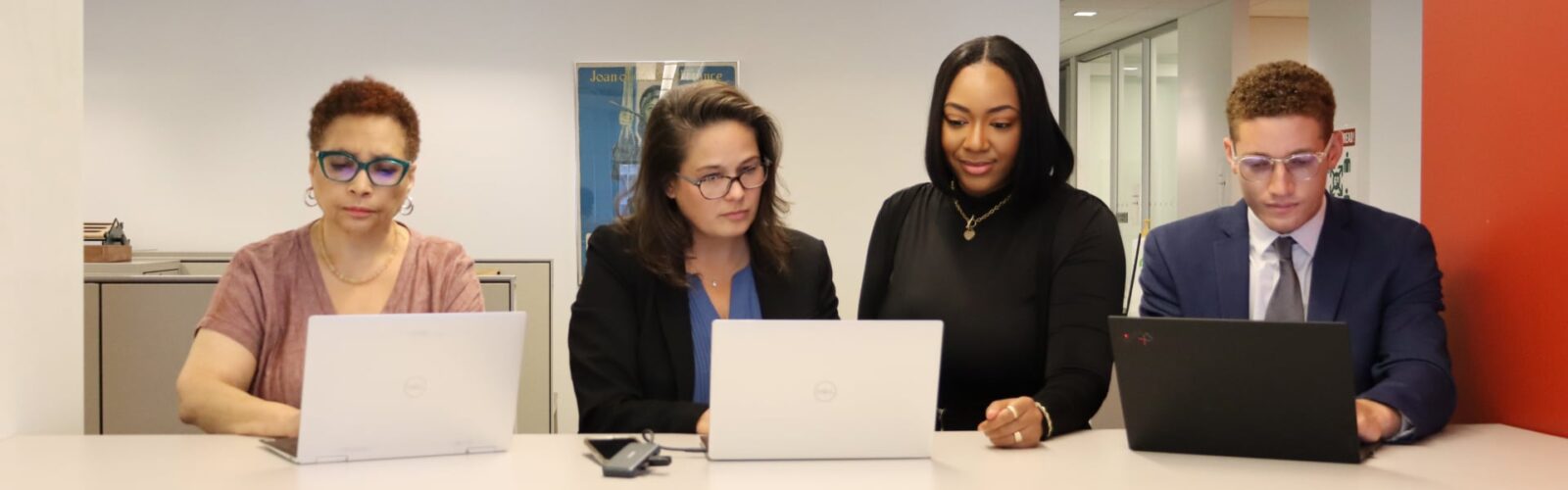 Four colleagues collaborating